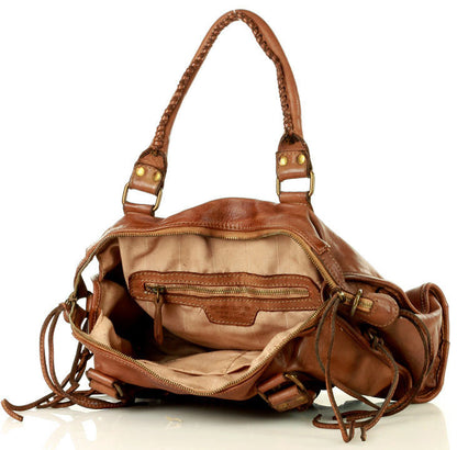BOHO shoulder bag - bowling bag made of vintage leather with rivets and fringes