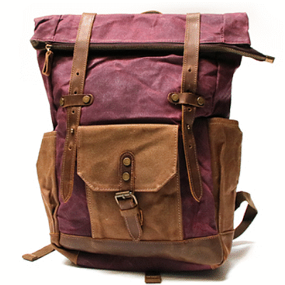 Premium Vintage Rucksack aus gewachstem Canvas und Echtleder in Dunkelrot für Damen und Herren, exklusiver Retro-Rucksack mit Echtleder-Applikationen und robustem Reißverschluss, detailreiche Frontaufnahme.