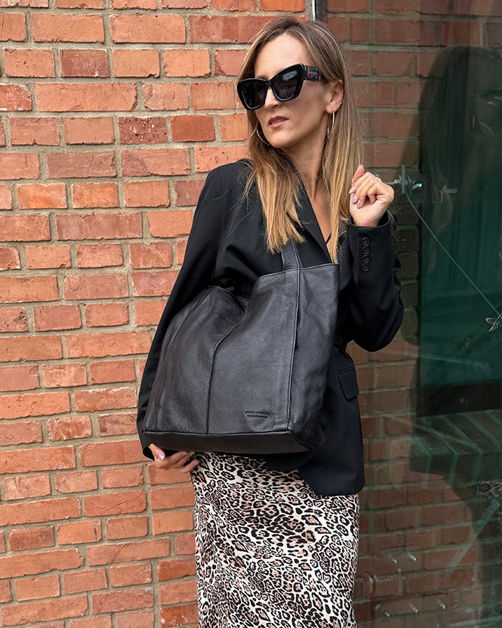 Women's black shopper bag made of soft Italian calf leather for university and everyday use
