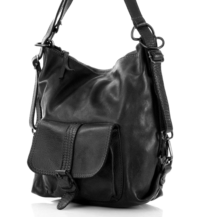 Klassische Leder Rucksacktasche Damen in Schwarz mit 2-in-1 Funktion vor neutralem Hintergrund für den Business-Look.