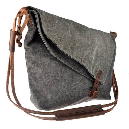 Elegante Vintage Hobo-Damentasche Crossbody aus grauem Canvas und Echtleder in der Vorderansicht.